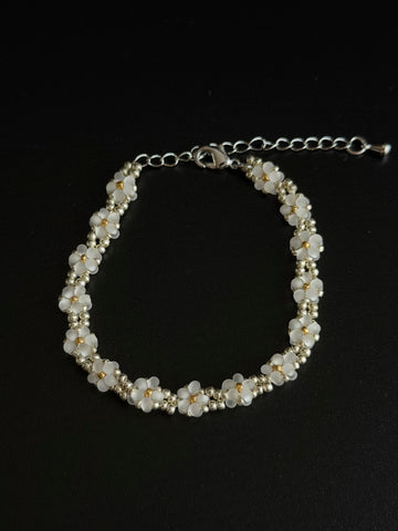 Daisy Bead Bracelet flat product image on dark background