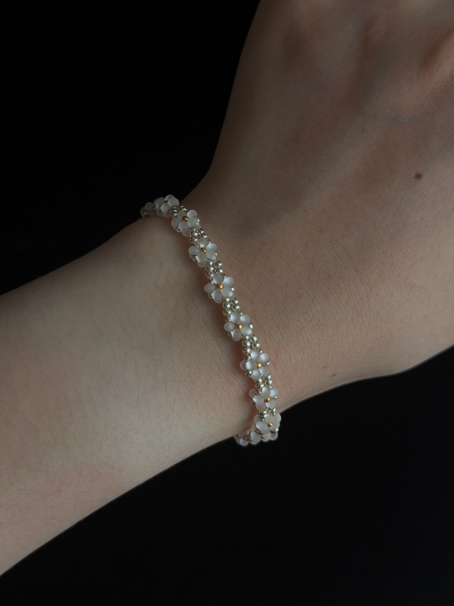 Daisy Bead Bracelet worn on wrist showing the handwoven seed bead pattern